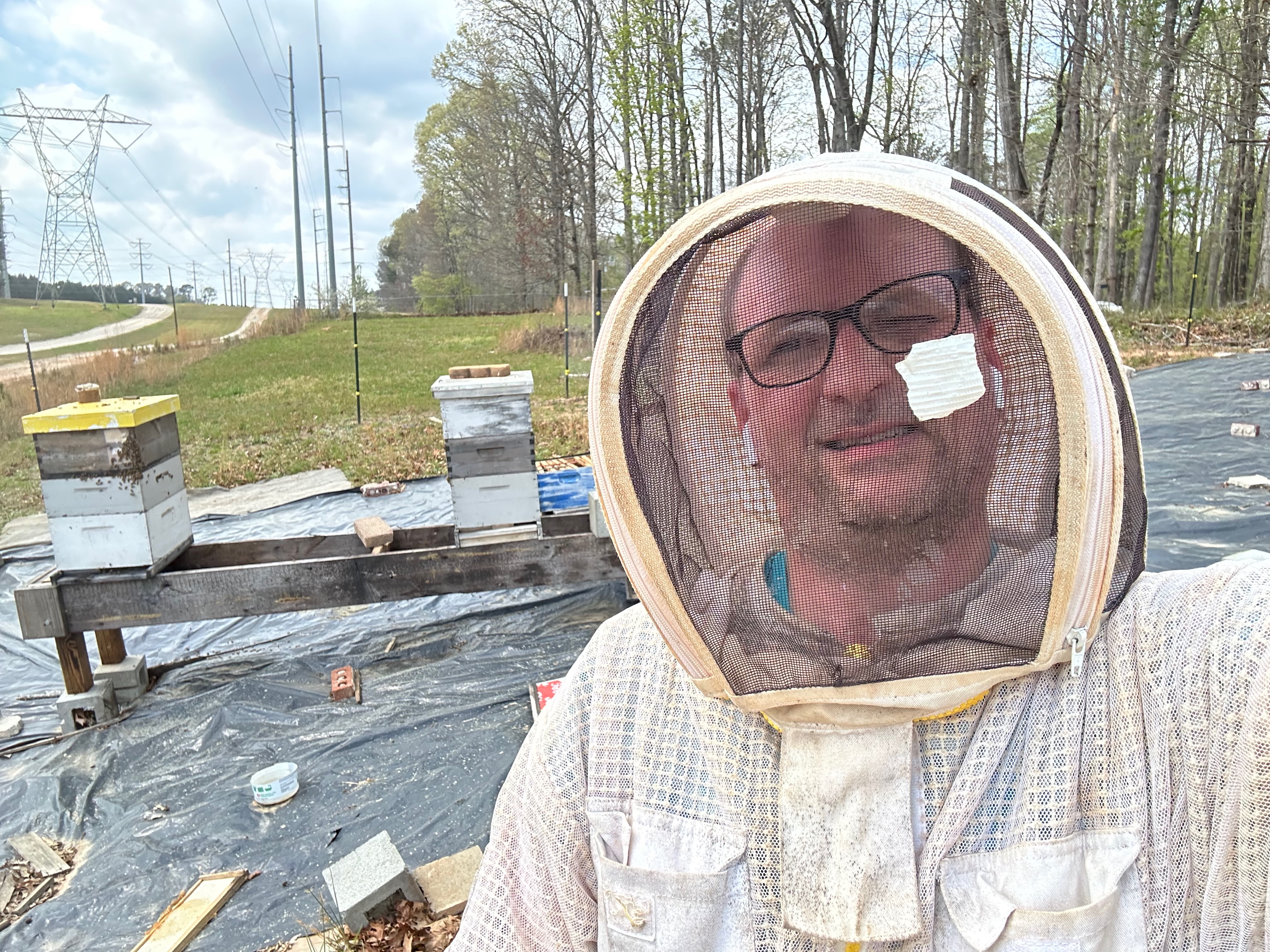 Pastor Michael at the apiary